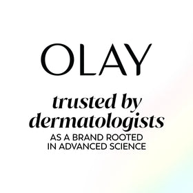 Olay 1.3 oz bottle beside everyday items showing true size and portability