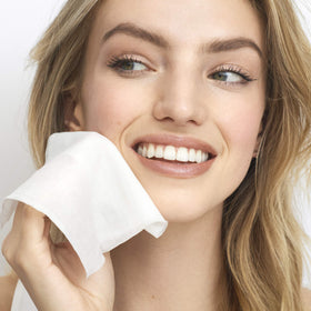 Olay wipe removing waterproof mascara from lashes demonstrating effective removal
