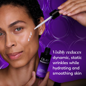 Olay serum dropper dispensing a clear drop, demonstrating precise application benefit
