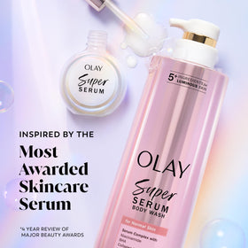 Olay bottle held in hand showing 18.5 fl oz scale and value