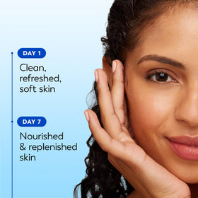 Olay wipe next to hand to show 66-count size and portability