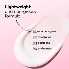 Olay bottle next to hand for size scale and travel-friendly portability