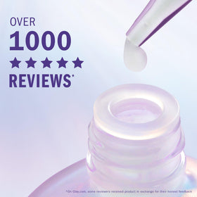 Olay on bedside table in bedroom scene showing relaxing nighttime skincare benefit