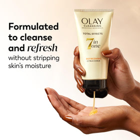 Product being applied to hand showing Olay total effects gentle texture