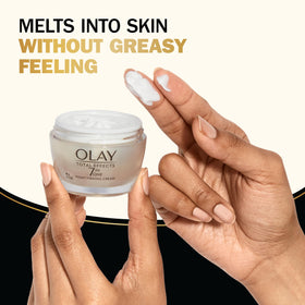 Olay Total Effects 1.7 oz jar beside ruler showing compact size for travel benefit
