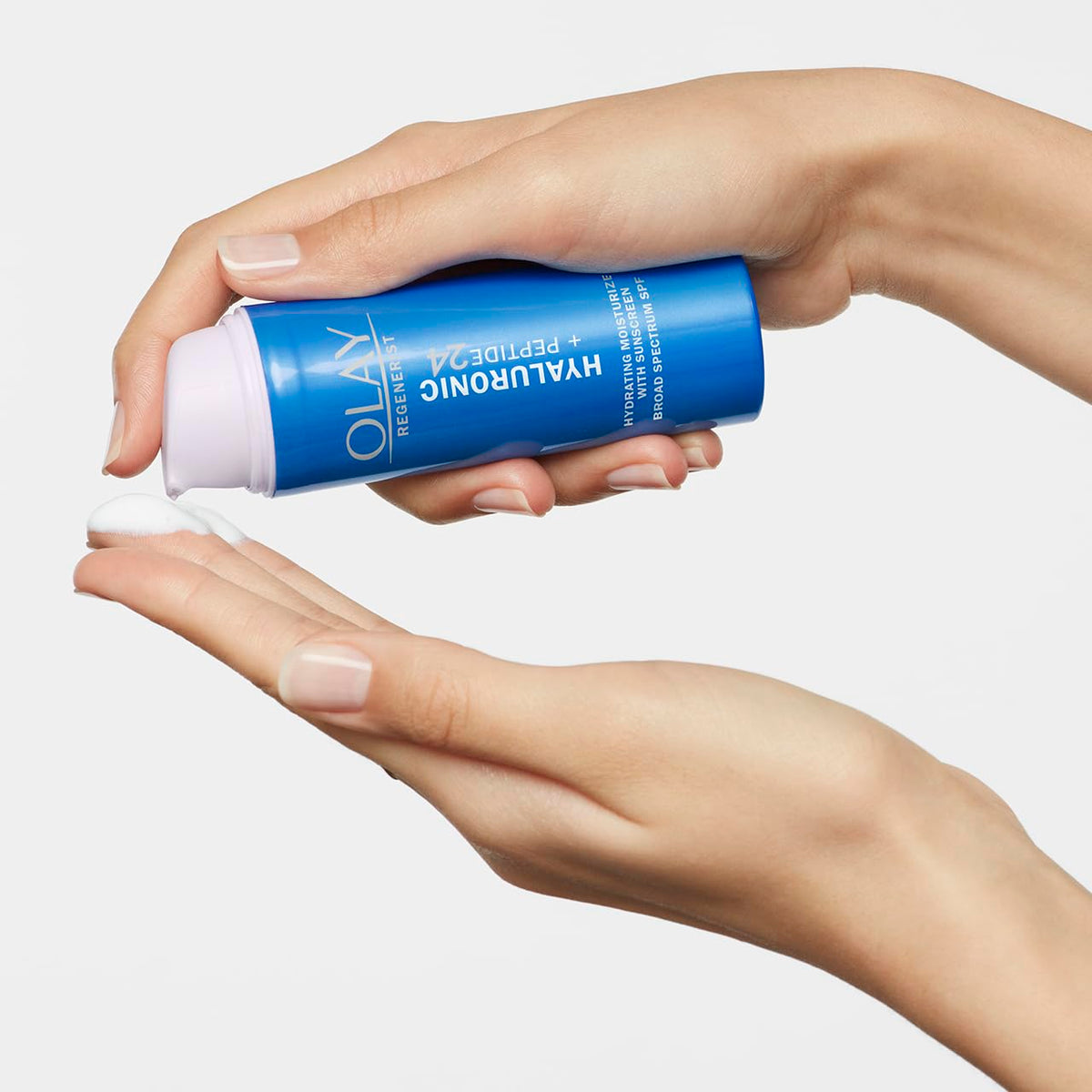 Olay tube styled with makeup items showing easy layering before cosmetics