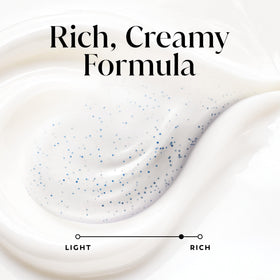Olay product lather in hand illustrating gentle exfoliation and softness