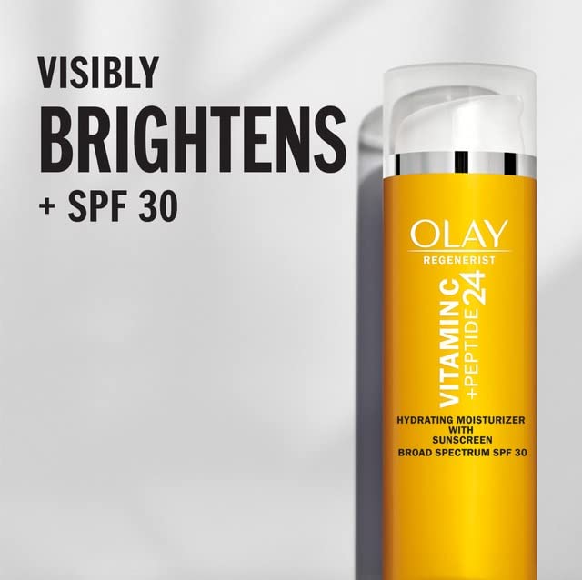 Olay moisturizer being smoothed onto cheek showing instant hydration effect