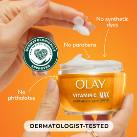 Olay 1.7 oz jar next to a ruler showing compact travel size
