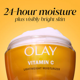 Olay moisturizer applied under sunscreen for protected daytime radiance