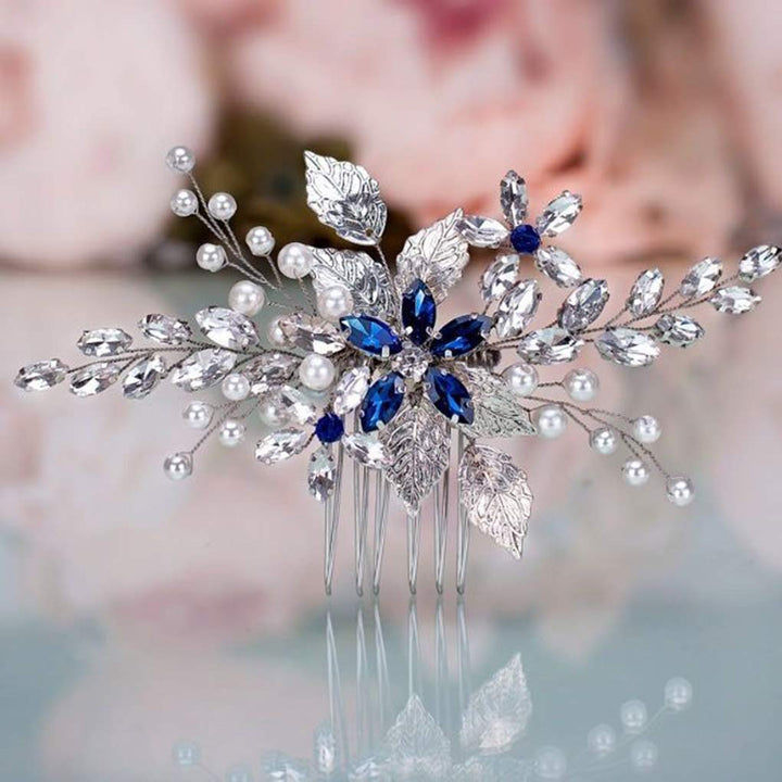 Olbye front view blue rhinestone comb showing sparkling accent and elegant finish