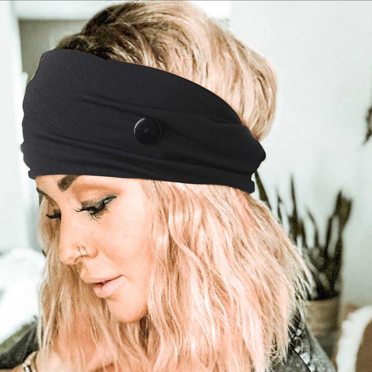 Olbye headband in hand showing compact portability and travel convenience benefit