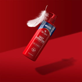 Old Spice bottle next to a water glass showing 16 fl oz scale advantage