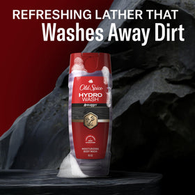 Old Spice Hydro Wash on shower shelf styled with other grooming items for layering scents