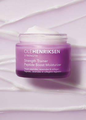 Ole Henriksen size scale beside ruler illustrating 1.7 fl oz travel-friendly jar