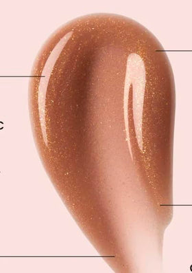 Ole Henriksen texture close-up of shimmery balm, shows hydrating creamy finish
