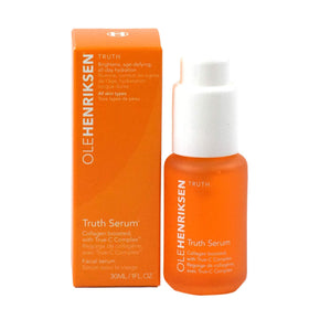 Ole Henriksen bottle next to common objects to show true 1.0 fl oz scale and portability