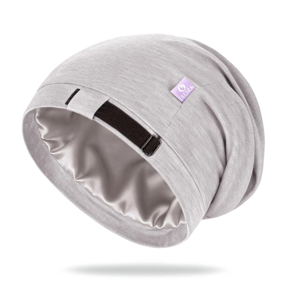 OLESILK bonnet front view showing neat fit and light grey color for smooth sleep
