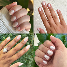 Hand applying Olive & June Atlas Pearly White during at-home manicure showing ease benefit