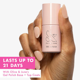 Olive & June brush and cap close-up for precise application benefit