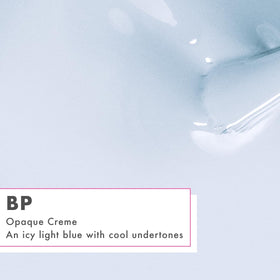 Close-up of Olive & June label and cap highlighting clean formula benefit