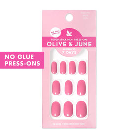 Olive & June close-up of taffy bright pink press-on nail showing glossy finish