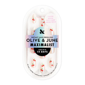 olive & june close-up of sharp French tip texture for realistic salon shine