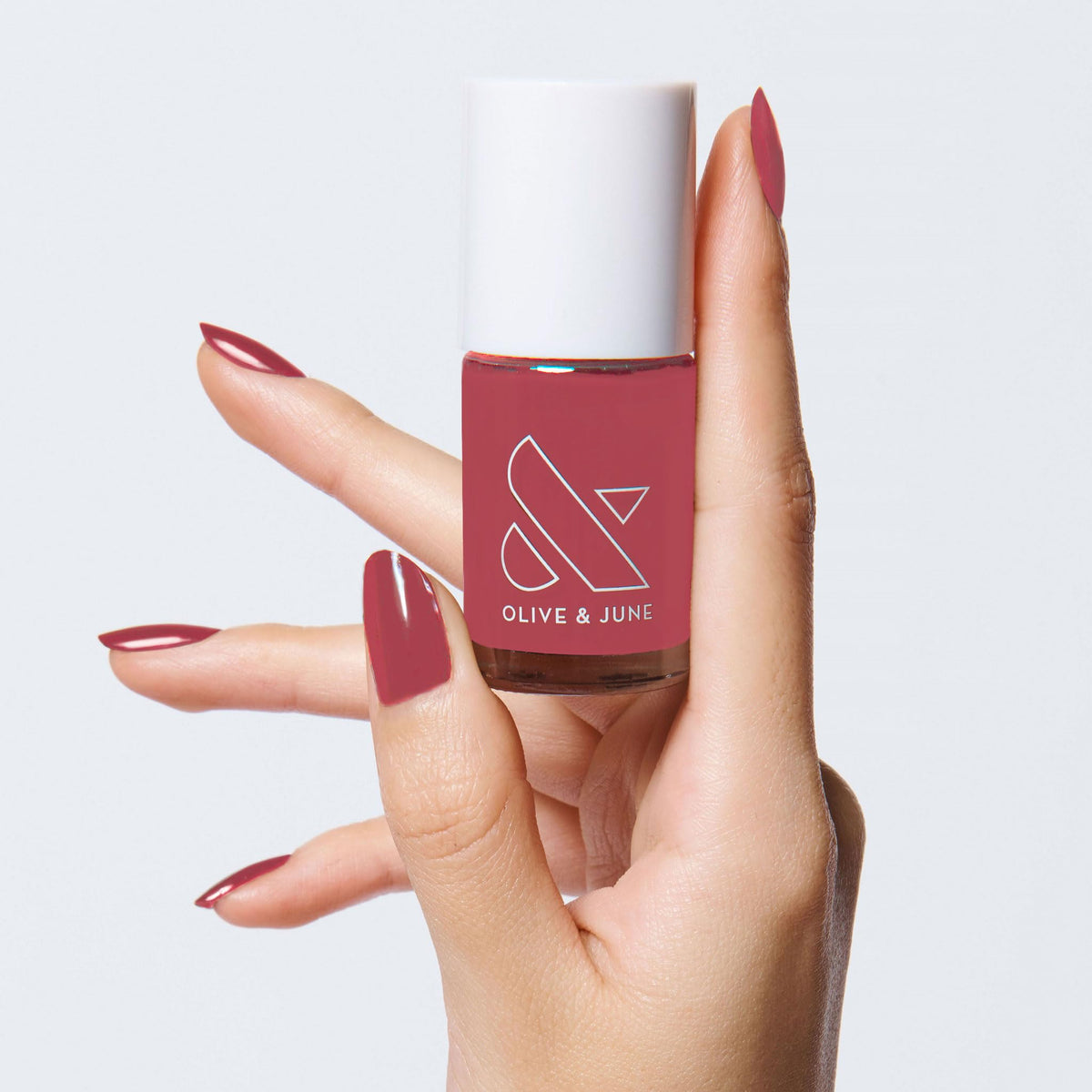 Olive & June front bottle showing LD Rosy Neutral and easy polish use