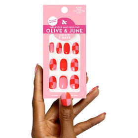 Olive & June front packaging showing pink checker design and included tools for easy setup