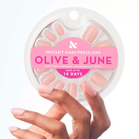 Olive & June front packaging showing full Instant Mani kit and benefits