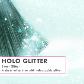 Olive & June holo glitter swatch on sample tip showing multi-dimensional sparkle