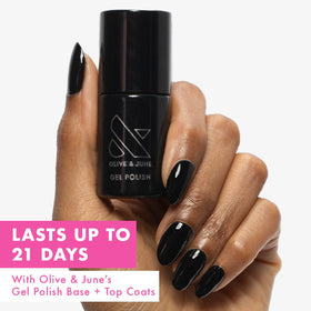 Olive & June brush and swatch revealing smooth opaque black application