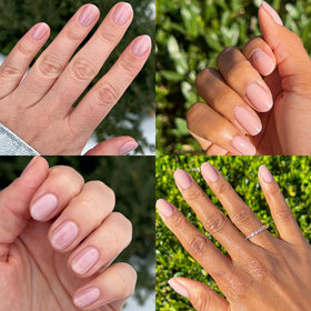 Hand wearing Olive & June mani displaying glossy gel-like finish and chip resistance