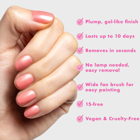 Olive & June hand model with finished manicure demonstrating salon finish