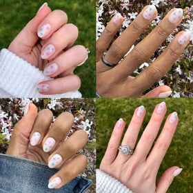 Olive & June nail on finger for scale showing natural-looking fit