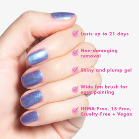 Hand model with Olive & June Mandalorian Grogu nails showing glossy finish benefit: salon-quality shine