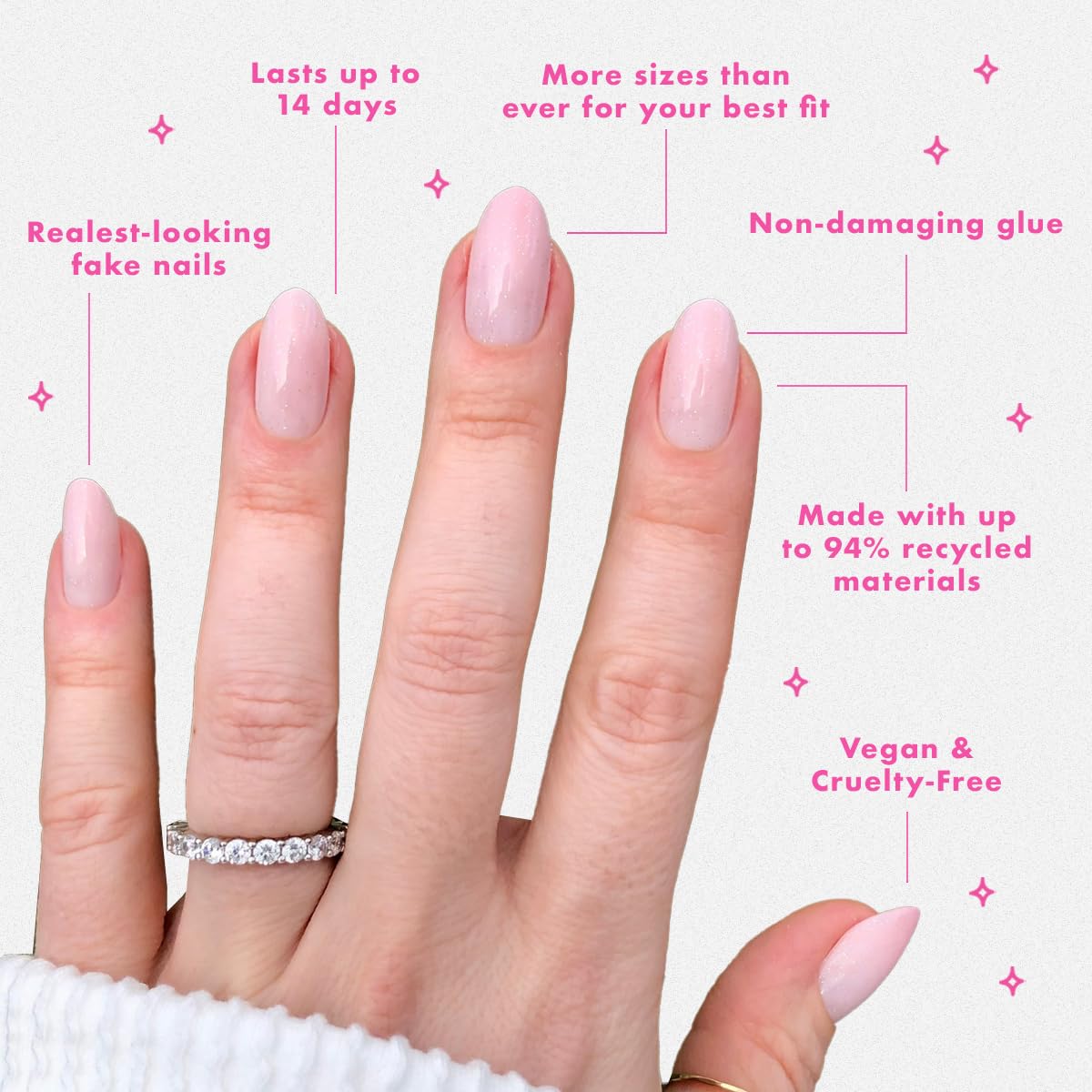 Olive & June nails on hand medium oval, demonstrating natural-looking wear