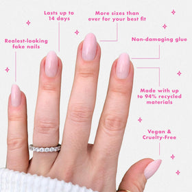 Olive & June nails on hand medium oval, demonstrating natural-looking wear