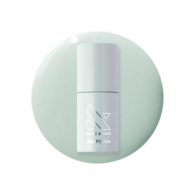 Olive & June bottle of Pastel Sage showing label and glossy finish benefit