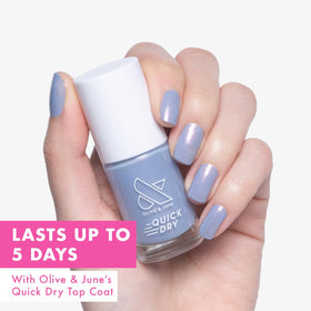 Olive & June wide fan brush detail for streak-free, even application