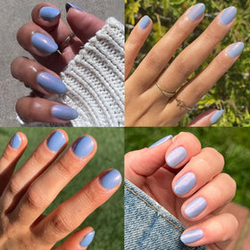 Olive & June periwinkle swatch on wrist showing color payoff