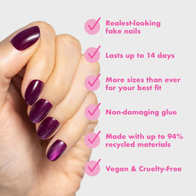 Hand applying Olive & June press-on nail demonstrating quick 30 second adhesion for lasting wear