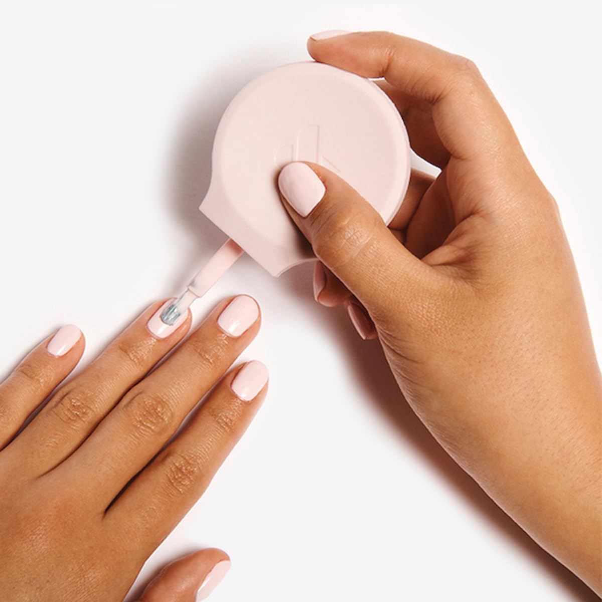Olive & June Poppy close-up of soft silicone texture providing a comfortable non-slip hold