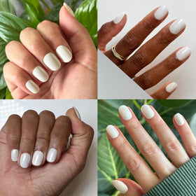 Olive & June press-on nail held in hand to show extra short round size and scale