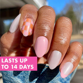olive & june press-on nails worn on hand showing almond medium shape for natural appearance