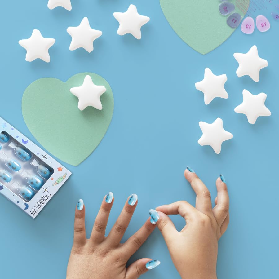 Olive & June press-ons worn on a child's hands showing quick salon-like results