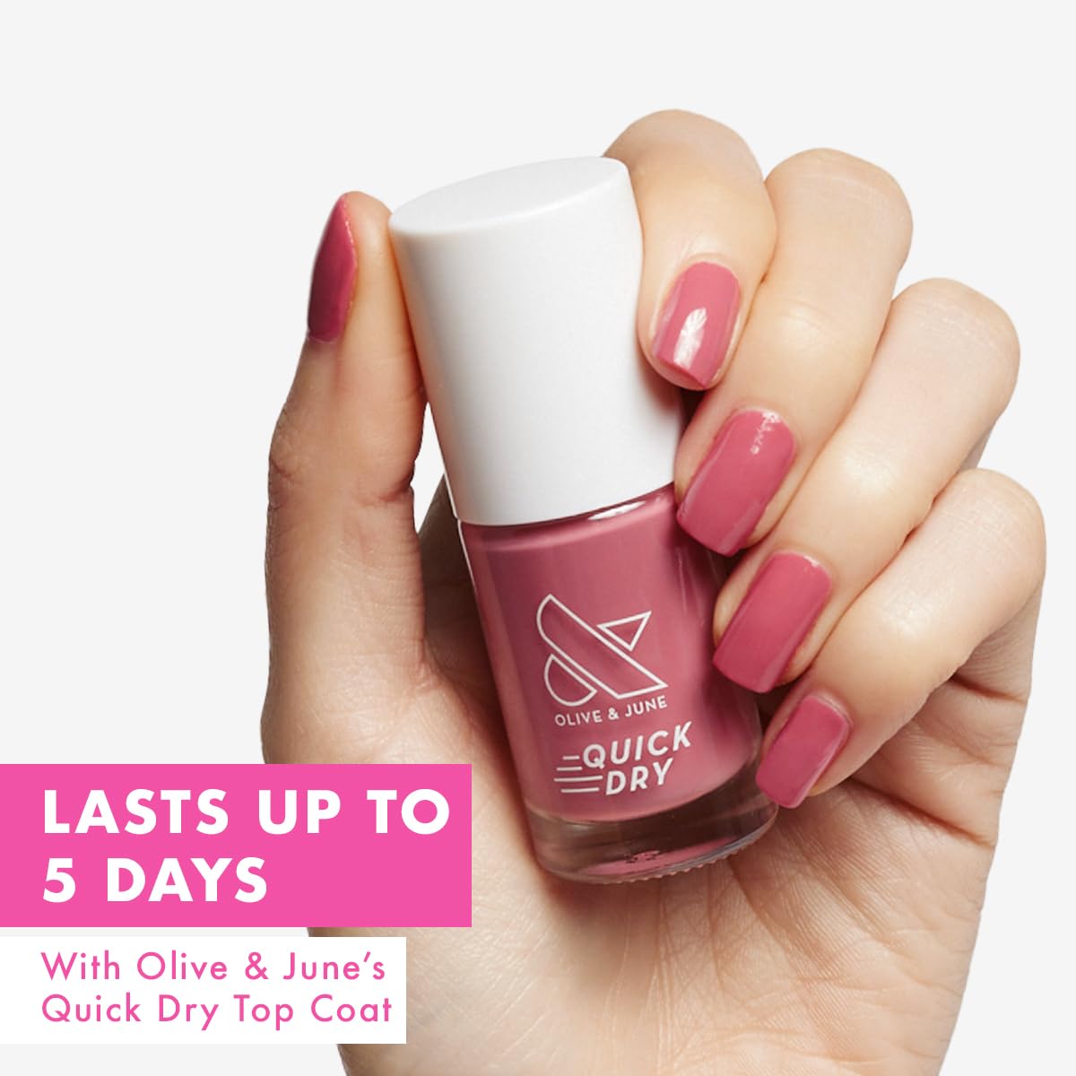 Olive & June wide fan brush close-up delivering even coverage for quick application