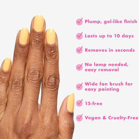 Olive & June polish being applied on nails showing easy at-home application and neat edges