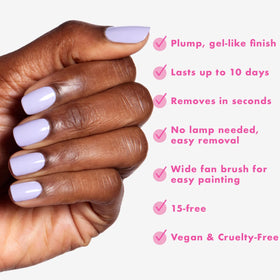 Olive & June swatch painted on fingertips showing true color payoff and coverage benefit