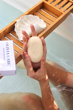 Olivia Care soap placed on bathroom dish demonstrating long-lasting, eco-friendly use